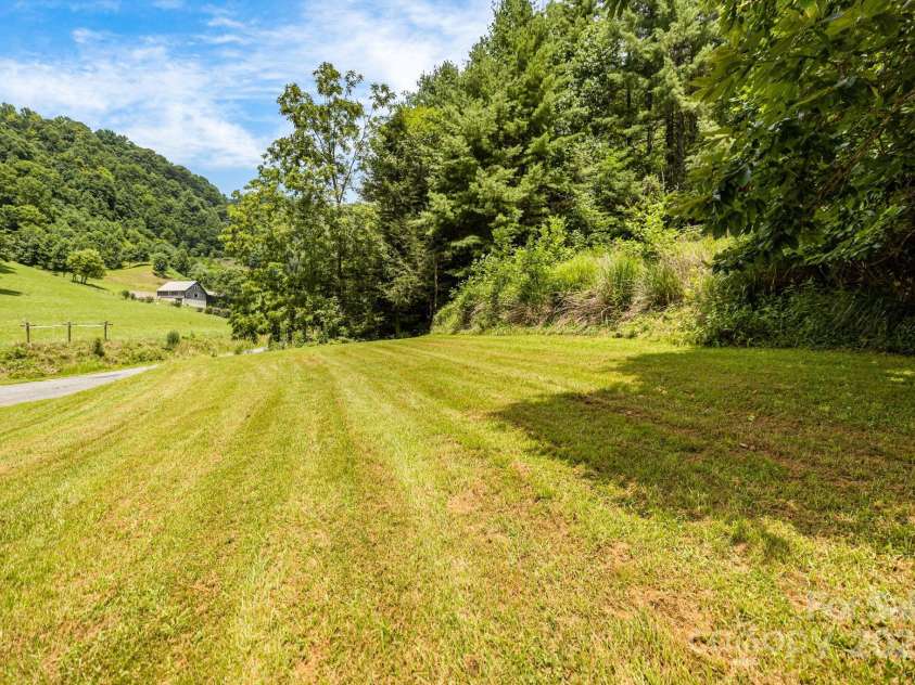 582 Lewis Branch Road, Marshall, NC 28753.  MLS# CAR4284450, YatesRealty ID 28023. 