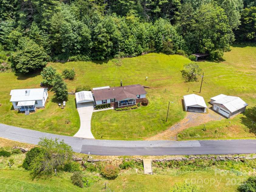 582 Lewis Branch Road, Marshall, NC 28753.  MLS# CAR4284450, YatesRealty ID 28023. 