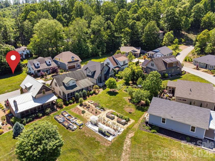 99999 Verde Drive, Asheville, NC 28806.  MLS# CAR4381556, YatesRealty ID 28023. Premier lot location across street from the community gardens and greenspace.