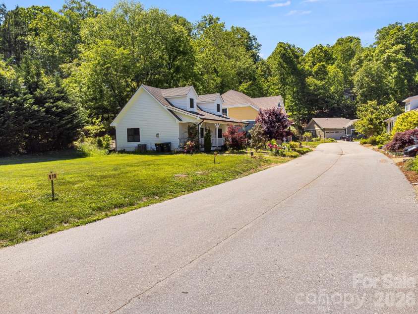 99999 Verde Drive, Asheville, NC 28806.  MLS# CAR4381556, YatesRealty ID 28023. Welcome to The Villages at Crest Mountain.  Asheville’s Premier Sustainable Eco-Community.