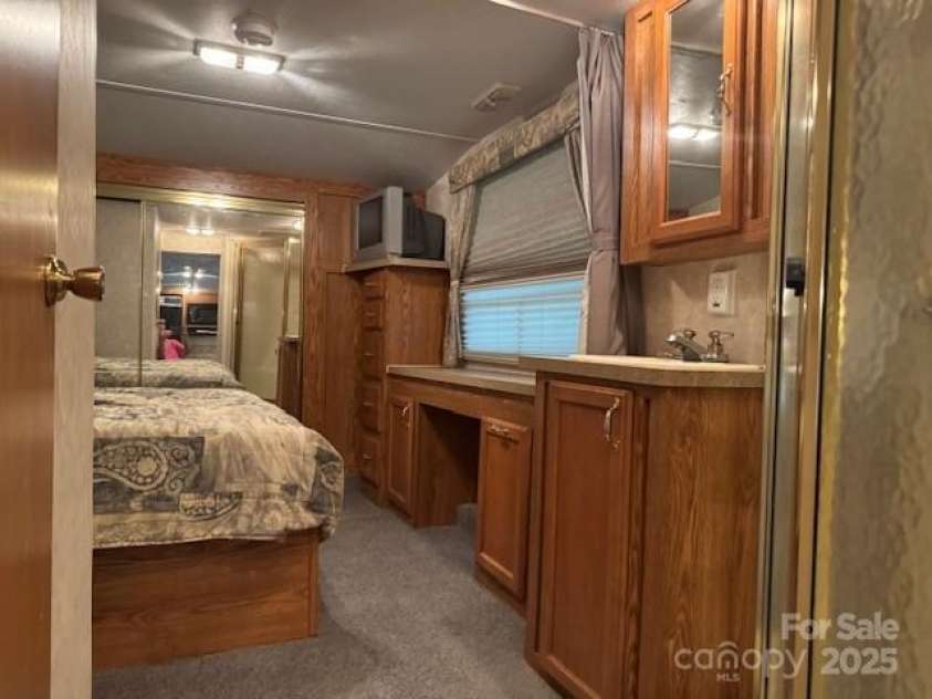 203 River Ridge Trail, Mount Gilead, NC 27306.  MLS# CAR4285438, YatesRealty ID 28025. 