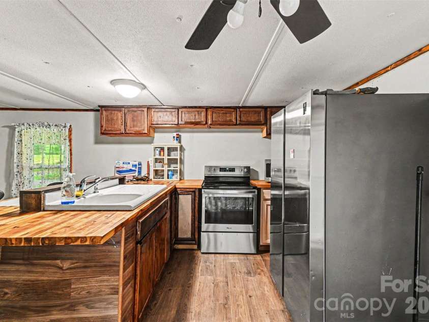 111 Oak Brook Drive, Mooresville, NC 28115.  MLS# CAR4389858, YatesRealty ID 28027. 