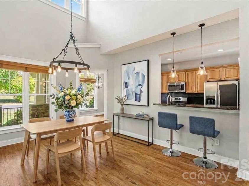 126 Carolina Bluebird Loop, Arden, NC 28704.  MLS# CAR4364125, YatesRealty ID 28030. Breakfast area and kitchen bar area - Virtually staged
