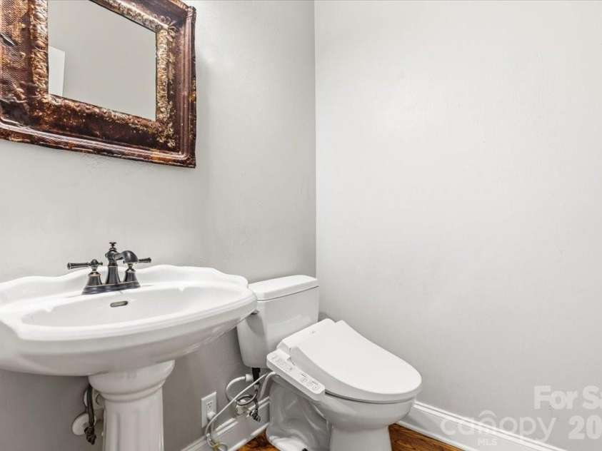 126 Carolina Bluebird Loop, Arden, NC 28704.  MLS# CAR4364125, YatesRealty ID 28030. Hall powder room