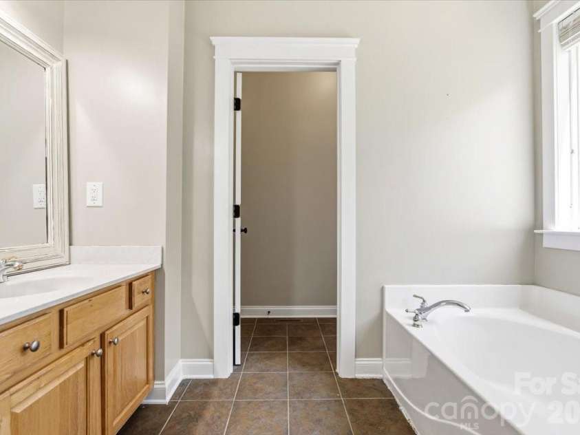 126 Carolina Bluebird Loop, Arden, NC 28704.  MLS# CAR4364125, YatesRealty ID 28030. Primary bath