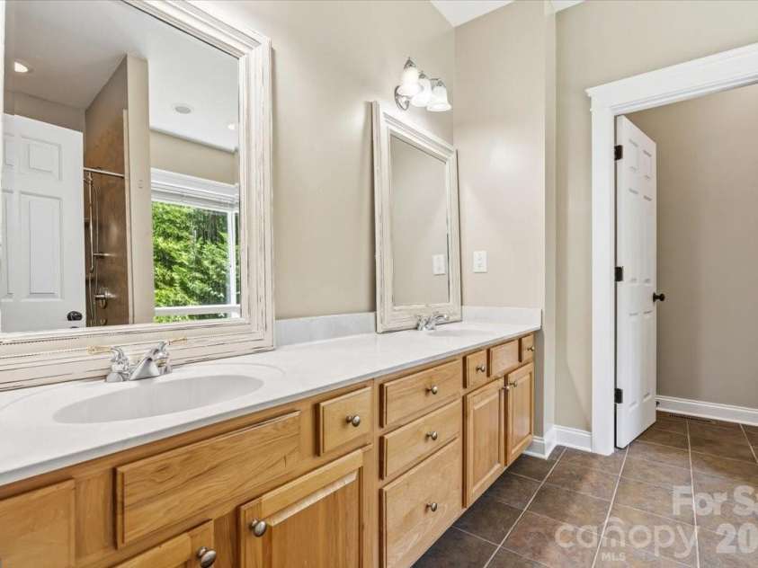 126 Carolina Bluebird Loop, Arden, NC 28704.  MLS# CAR4364125, YatesRealty ID 28030. Primary bath