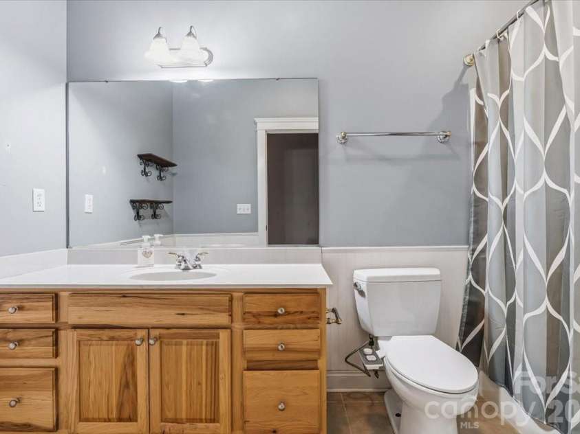 126 Carolina Bluebird Loop, Arden, NC 28704.  MLS# CAR4364125, YatesRealty ID 28030. Upper level bath