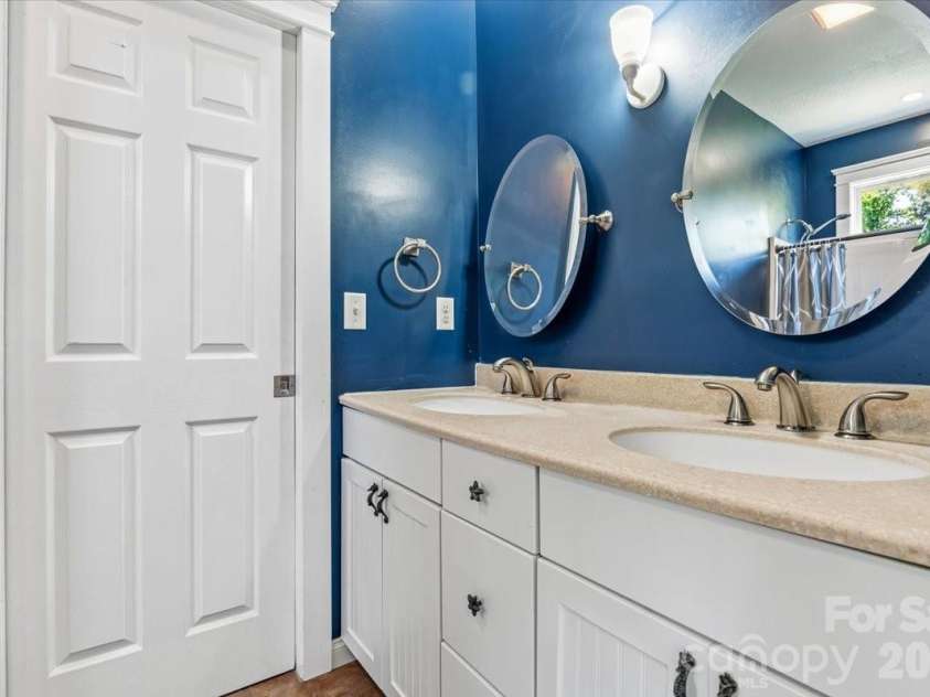 126 Carolina Bluebird Loop, Arden, NC 28704.  MLS# CAR4364125, YatesRealty ID 28030. Upper level bath between bedrooms 1 & 2