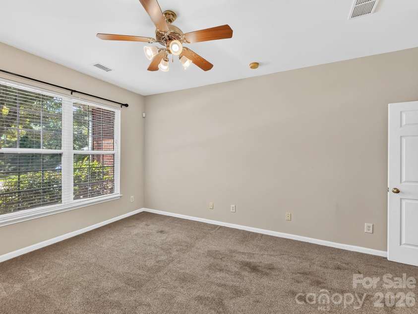 1788 Oakmont Drive, Denver, NC 28037.  MLS# CAR4388183, YatesRealty ID 28036. French doors open to a versatile flex space filled with natural light, offering the perfect setting for a home office, library, sitting room, or study.