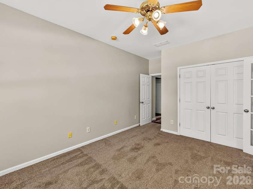 1788 Oakmont Drive, Denver, NC 28037.  MLS# CAR4388183, YatesRealty ID 28036. French doors open to a versatile flex space filled with natural light, offering the perfect setting for a home office, library, sitting room, or study.