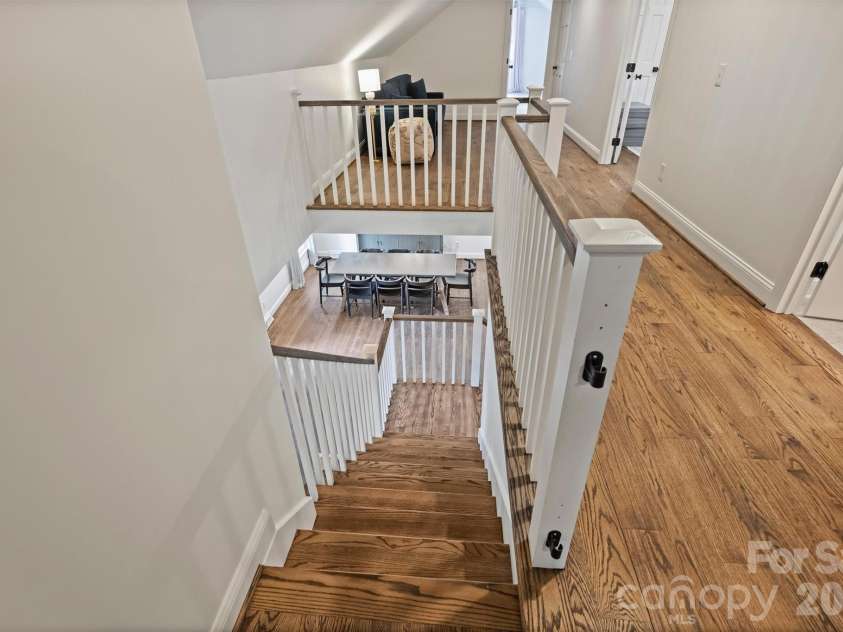 601 Lansdowne Road, Charlotte, NC 28270.  MLS# CAR4388769, YatesRealty ID 28037. Stairs leading to upper level