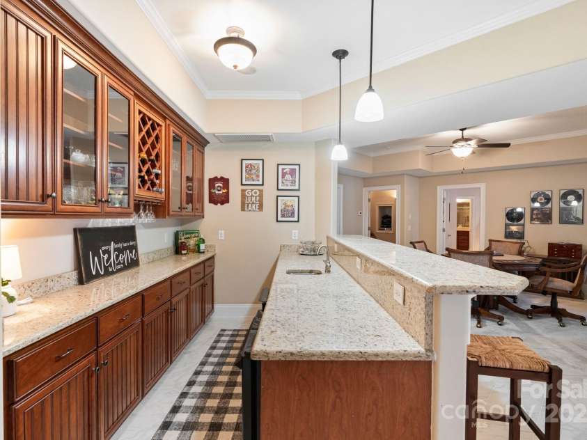 9225 Fair Oak Drive, Sherrills Ford, NC 28673.  MLS# CAR4319433, YatesRealty ID 2804. Basement Bar/Entertainment