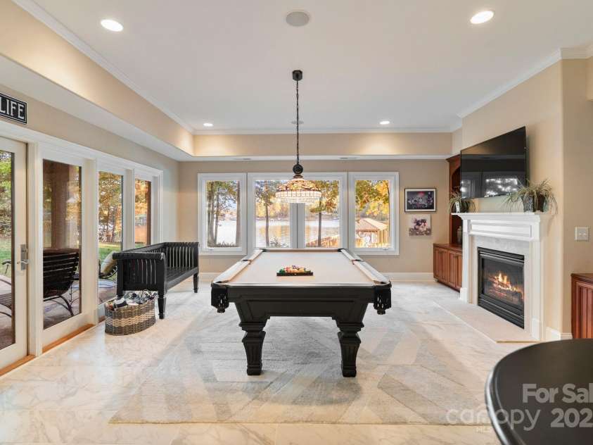 9225 Fair Oak Drive, Sherrills Ford, NC 28673.  MLS# CAR4319433, YatesRealty ID 2804. Basement Living/Billiard with FP