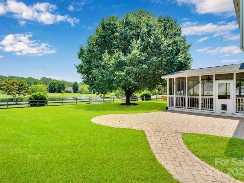 2004 Onotoa Drive, Indian Trail, NC 28079.  MLS# CAR4272970, YatesRealty ID 28047. Gorgeous pond views!