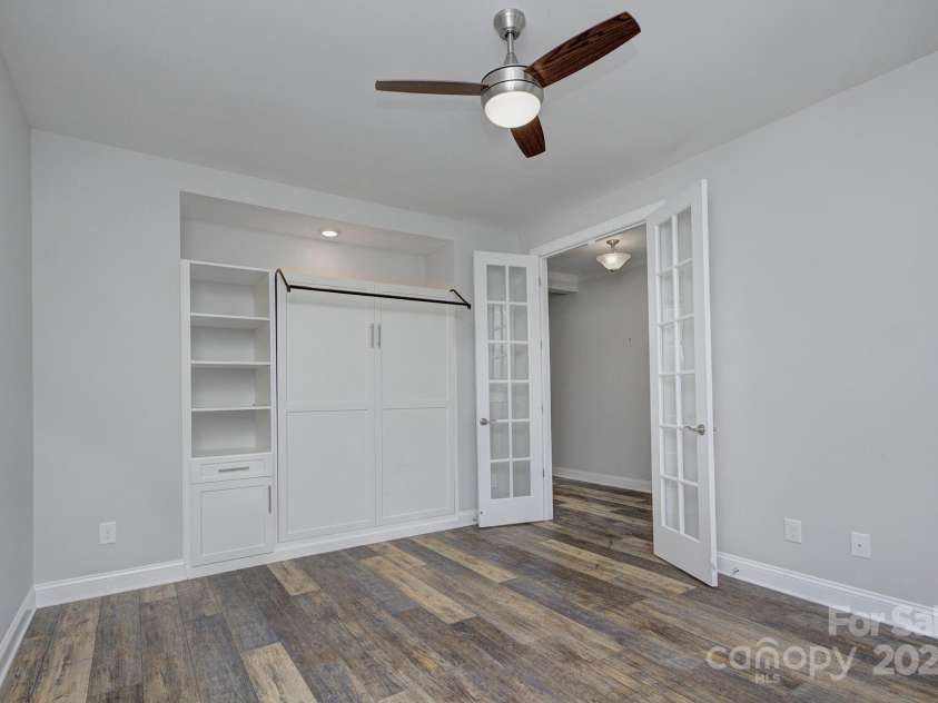 5527 Cheerful Lane, Charlotte, NC 28215.  MLS# CAR4275434, YatesRealty ID 28049. Office with built in shelving/ cabinets/storage 
