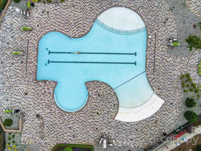 5527 Cheerful Lane, Charlotte, NC 28215.  MLS# CAR4275434, YatesRealty ID 28049. Outdoor pool area- zero entry pool 