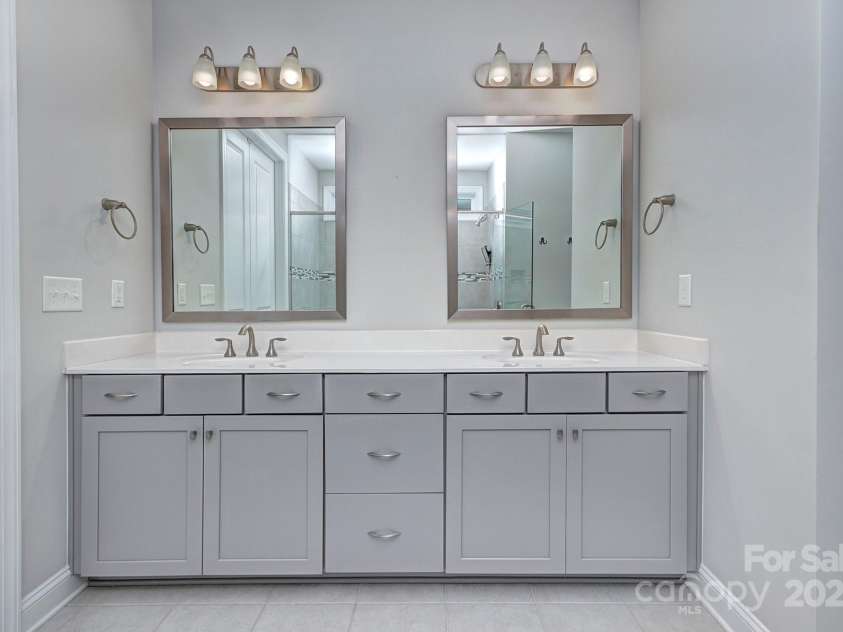 5527 Cheerful Lane, Charlotte, NC 28215.  MLS# CAR4275434, YatesRealty ID 28049. Primary bathroom-  Raised vanity, double sinks, great storage with drawer stack and cabinets 