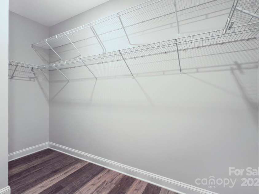 5527 Cheerful Lane, Charlotte, NC 28215.  MLS# CAR4275434, YatesRealty ID 28049. Primary bedroom closet has extra shelving-- Is an 