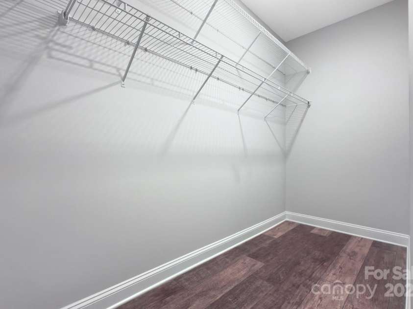 5527 Cheerful Lane, Charlotte, NC 28215.  MLS# CAR4275434, YatesRealty ID 28049. Second view of primary closet 