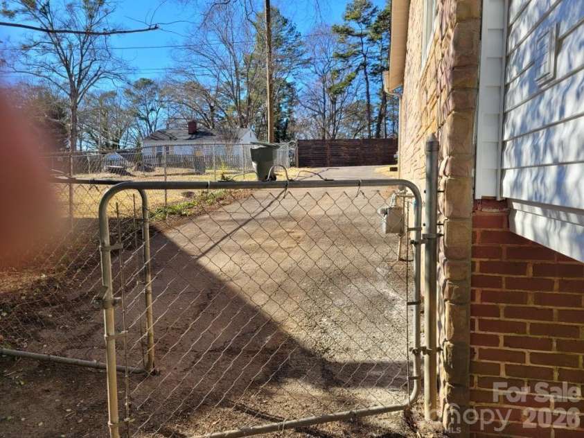 1116 East Drive, Gastonia, NC 28052.  MLS# CAR4353217, YatesRealty ID 2805. Gate