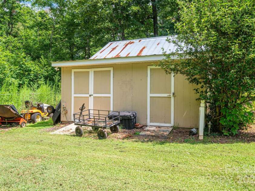 1824 Hephzibah Church Road, Bessemer City, NC 28016.  MLS# CAR4280999, YatesRealty ID 28051. Side of Storage Building