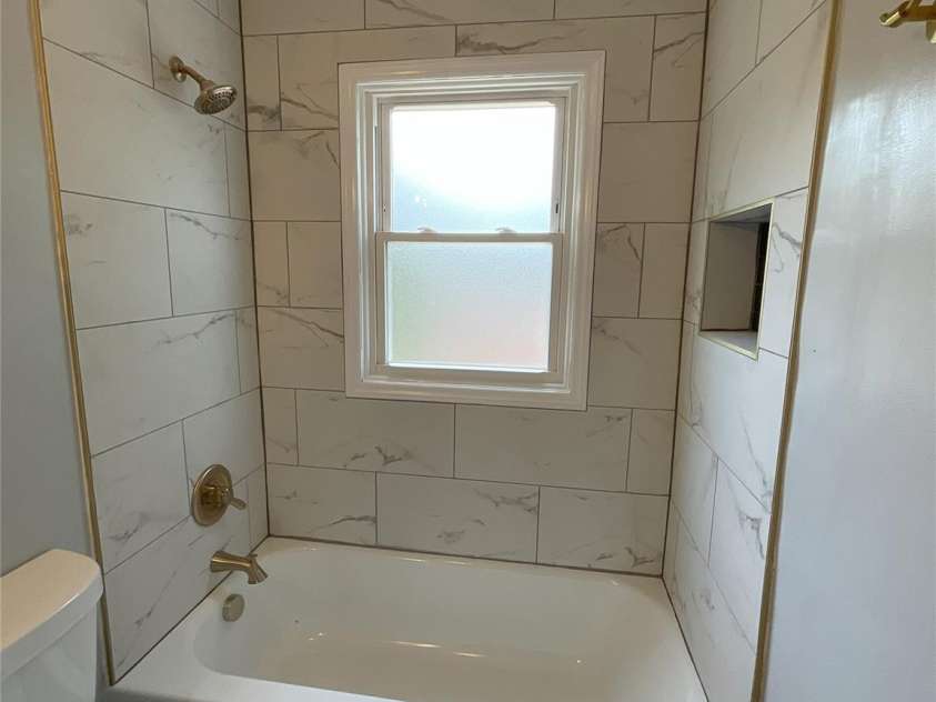 2607 /2609 Celia Avenue, Charlotte, NC 28216.  MLS# CAR4280740, YatesRealty ID 28052. 2607 bathroom