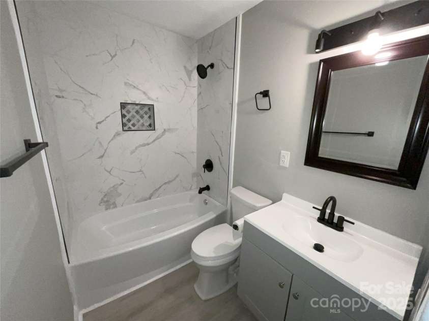 2607 /2609 Celia Avenue, Charlotte, NC 28216.  MLS# CAR4280740, YatesRealty ID 28052. 2609 bathroom