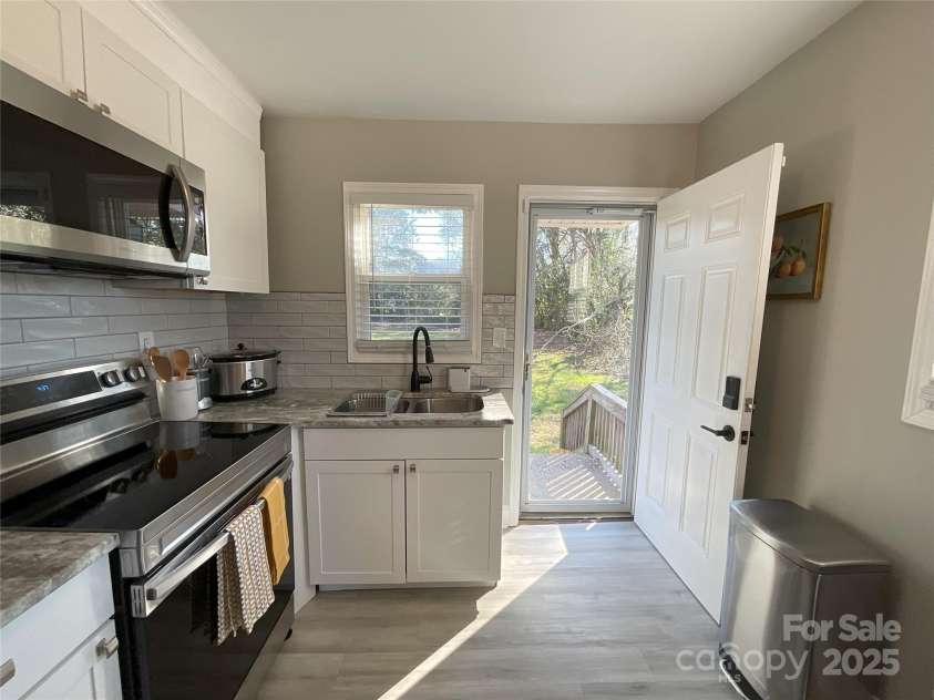 2607 /2609 Celia Avenue, Charlotte, NC 28216.  MLS# CAR4280740, YatesRealty ID 28052. 2609 kitchen (previously furnished)