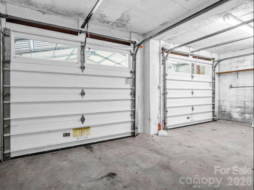 620 Smith Waldrop Road, Columbus, NC 28722.  MLS# CAR4379535, YatesRealty ID 28052. 2 newer garage doors