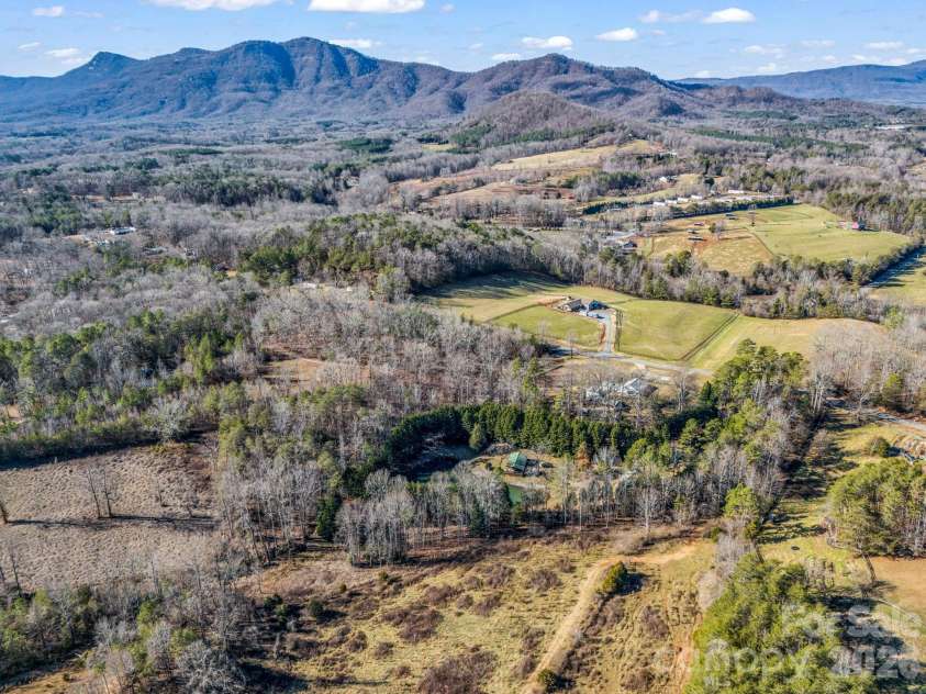 620 Smith Waldrop Road, Columbus, NC 28722.  MLS# CAR4379535, YatesRealty ID 28052. Drone pic towards Mtns.