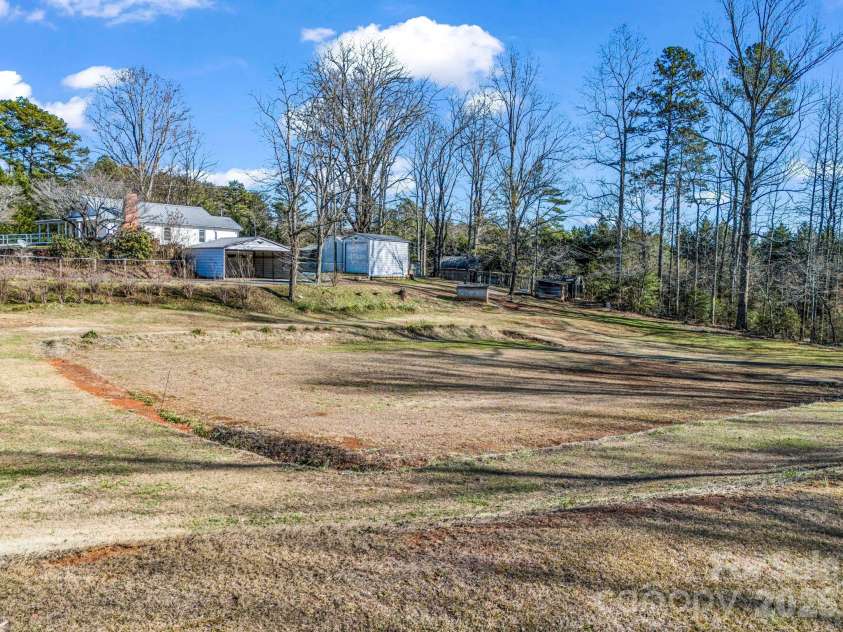 620 Smith Waldrop Road, Columbus, NC 28722.  MLS# CAR4379535, YatesRealty ID 28052. Established garden area