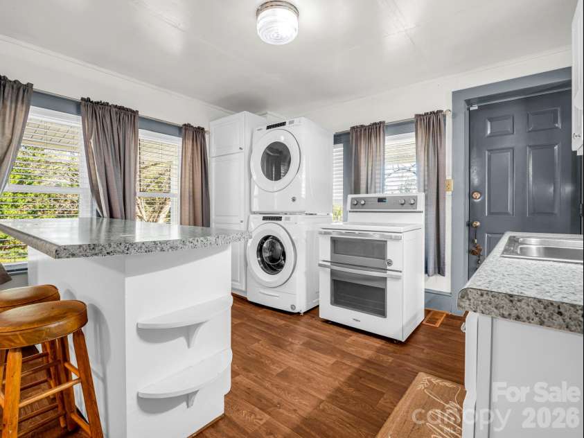 620 Smith Waldrop Road, Columbus, NC 28722.  MLS# CAR4379535, YatesRealty ID 28052. Kitchen opens to dining area