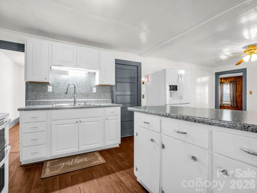 620 Smith Waldrop Road, Columbus, NC 28722.  MLS# CAR4379535, YatesRealty ID 28052. Kitchen opens to dining area
