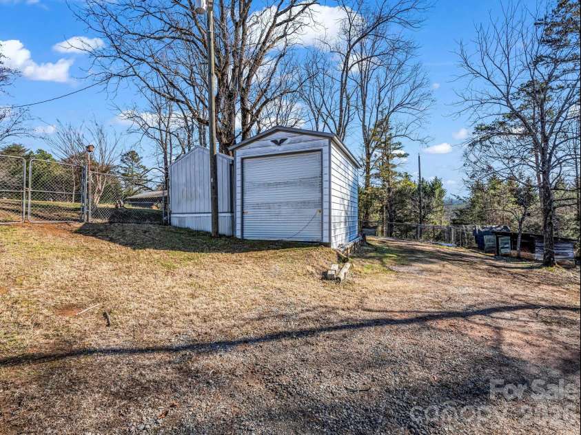 620 Smith Waldrop Road, Columbus, NC 28722.  MLS# CAR4379535, YatesRealty ID 28052. Multiple out buildings