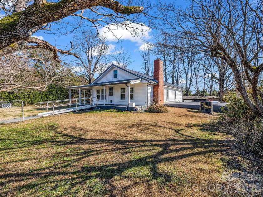 620 Smith Waldrop Road, Columbus, NC 28722.  MLS# CAR4379535, YatesRealty ID 28052. Right side yard