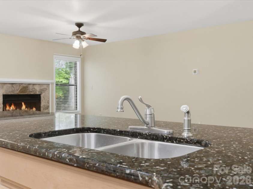 1011 Cranberry Circle, Fort Mill, SC 29715.  MLS# CAR4388076, YatesRealty ID 28053. Granite countertop and undermount sink.