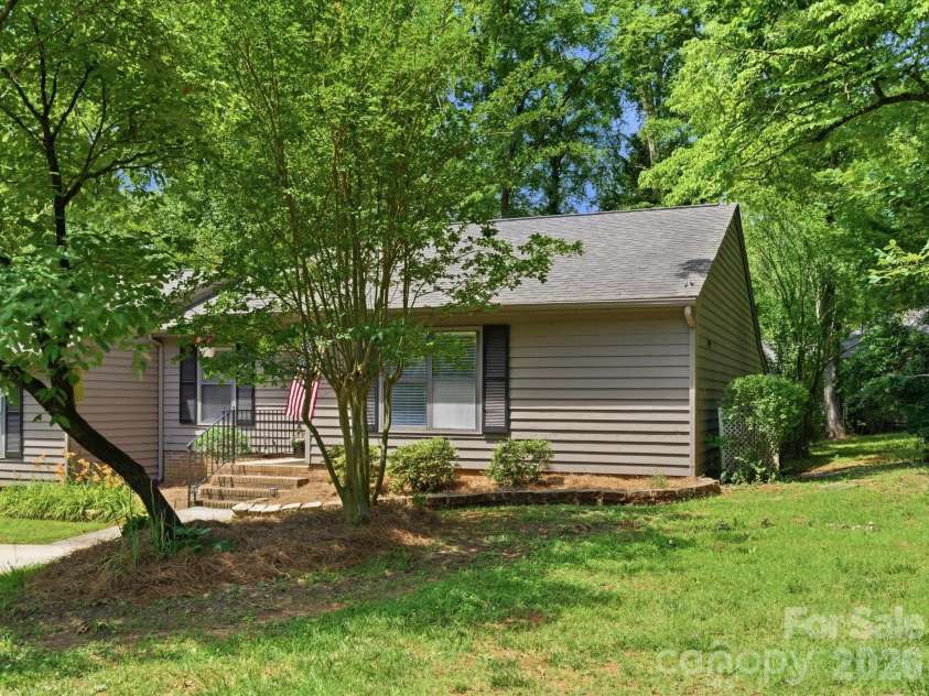 1011 Cranberry Circle, Fort Mill, SC 29715.  MLS# CAR4388076, YatesRealty ID 28053. Mature trees are the perfect complement to this home.