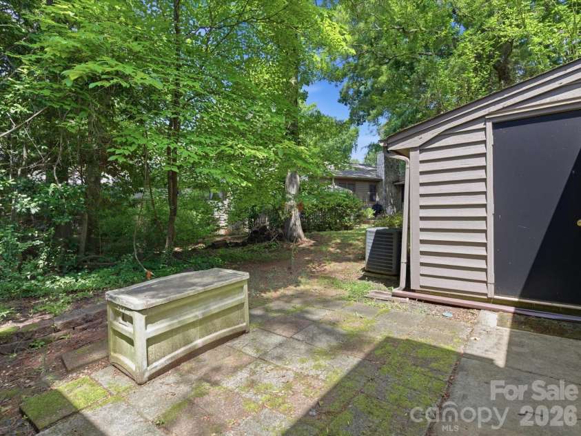 1011 Cranberry Circle, Fort Mill, SC 29715.  MLS# CAR4388076, YatesRealty ID 28053. Private patio with storage unit.