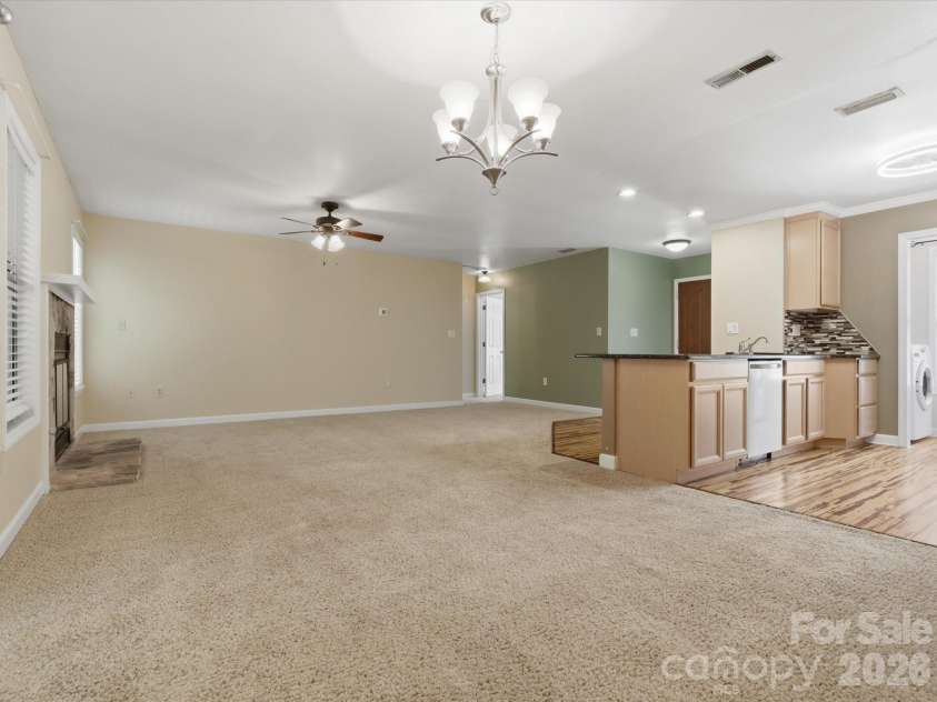 1011 Cranberry Circle, Fort Mill, SC 29715.  MLS# CAR4388076, YatesRealty ID 28053. View from dining area into great room and kitchen.