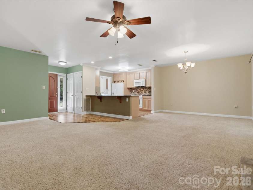 1011 Cranberry Circle, Fort Mill, SC 29715.  MLS# CAR4388076, YatesRealty ID 28053. View from fireplace into the dining and kitchen area.