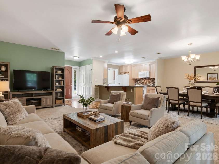 1011 Cranberry Circle, Fort Mill, SC 29715.  MLS# CAR4388076, YatesRealty ID 28053. Virtually Staged great room and dining area.