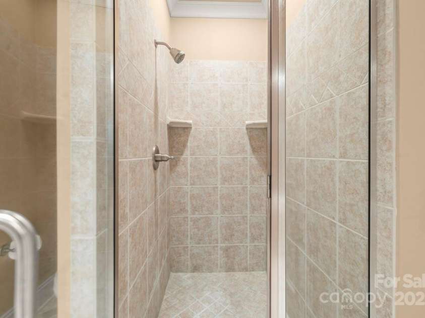 343 Wester Brewlands Road, Iron Station, NC 28080.  MLS# CAR4284507, YatesRealty ID 28060. BATH 3 with soaking tub! Enjoy the ultimate relaxation in this spa-inspired bath featuring a deep soaking tub tucked into a cozy alcove—ideal for unwinding after a long day