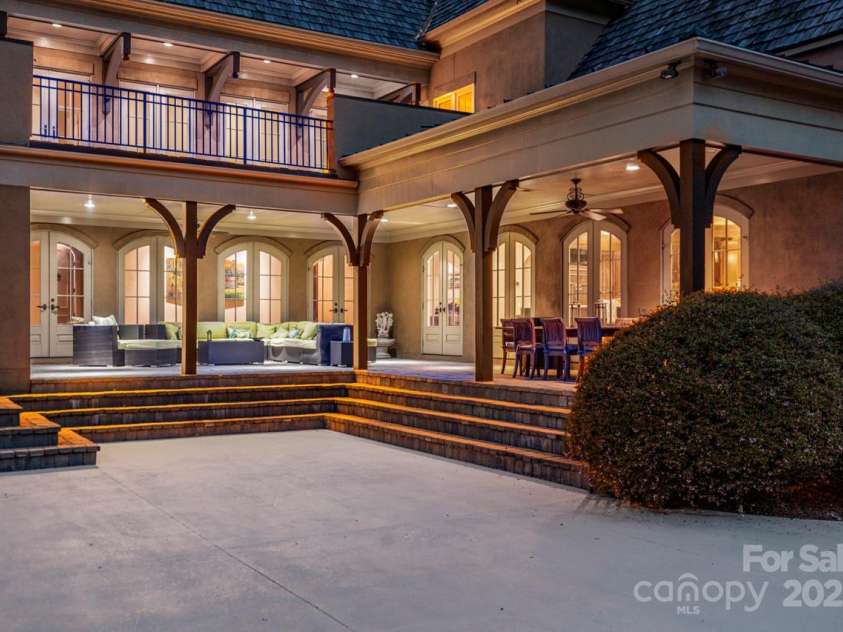 343 Wester Brewlands Road, Iron Station, NC 28080.  MLS# CAR4284507, YatesRealty ID 28060. Elevated Elegance with a View! The upper-level veranda offers a private perch for morning coffee, evening wine, or simply soaking in the scenic serenity of this exceptional estate. Overlooking the expansive pa