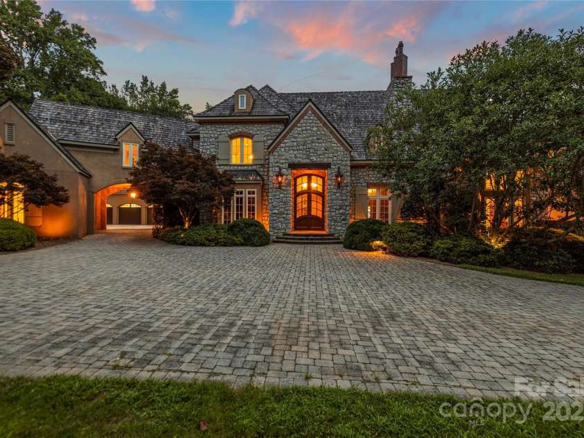 343 Wester Brewlands Road, Iron Station, NC 28080.  MLS# CAR4284507, YatesRealty ID 28060. Grand Entrance & Timeless Curb Appeal! A cobblestone circular drive welcomes you to this custom crafted estate with stone accents, dormer windows, and a stately entrance