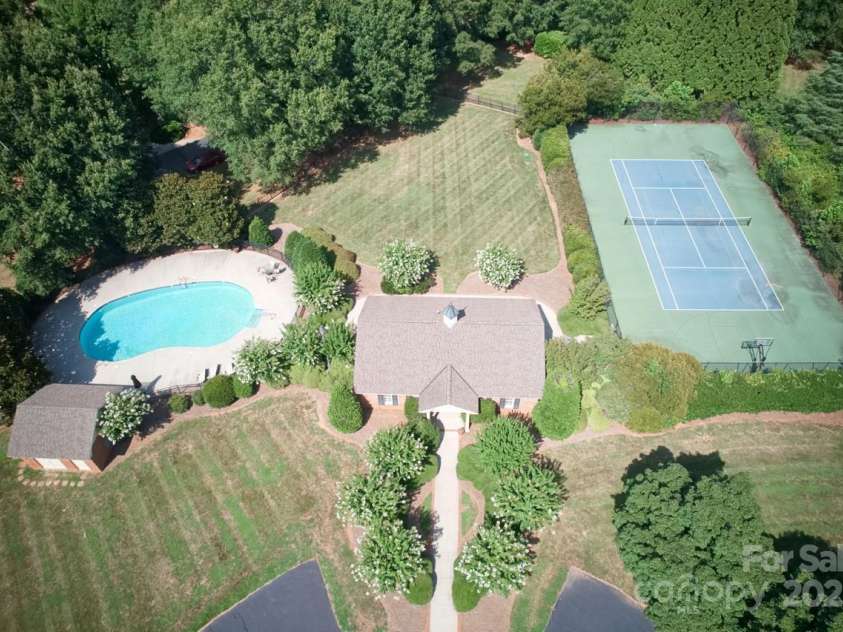 343 Wester Brewlands Road, Iron Station, NC 28080.  MLS# CAR4284507, YatesRealty ID 28060. Resort-Style Amenities in a Gated Setting!Within this private gated enclave, enjoy exclusive access to a refreshing outdoor pool, cabana and a full-sized sport court for year-round recreation
