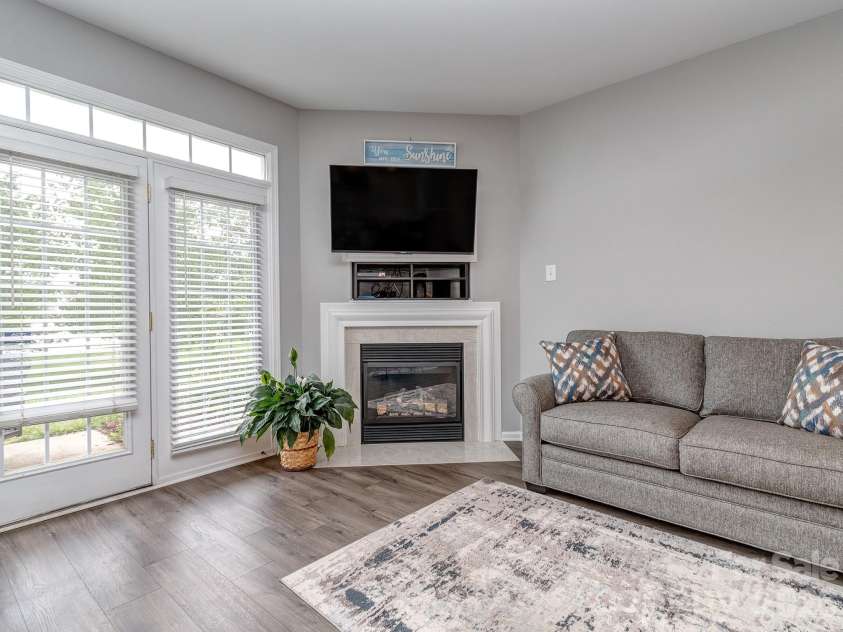 3064 Priory Ridge Drive, Fort Mill, SC 29707.  MLS# CAR4385929, YatesRealty ID 28063. Fireplace with gas logs