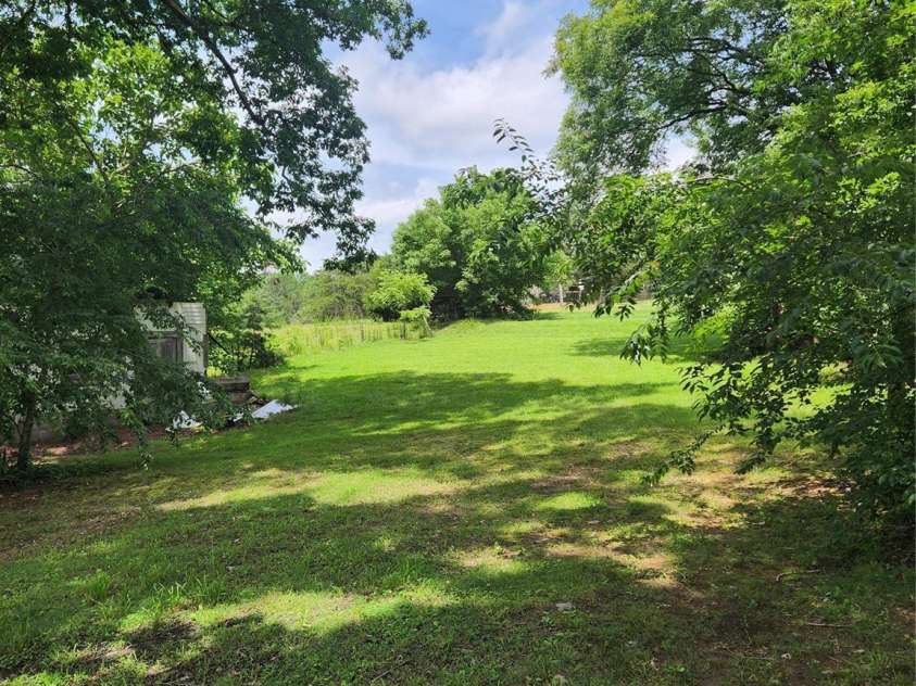 423 Tot Dellinger Road, Cherryville, NC 28021.  MLS# CAR4269760, YatesRealty ID 28063. Backyard