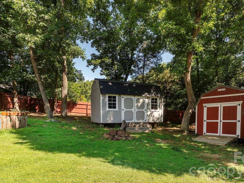 609 Forest Ridge Road, Kannapolis, NC 28083.  MLS# CAR4389499, YatesRealty ID 28064. 2 Storage buildings wired and ready for a workshop, or whatever you need