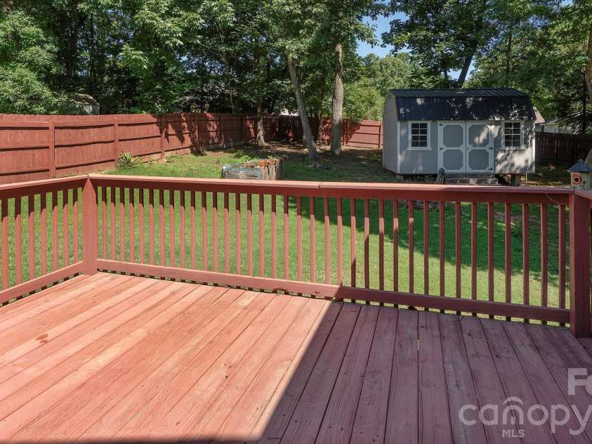 609 Forest Ridge Road, Kannapolis, NC 28083.  MLS# CAR4389499, YatesRealty ID 28064. Large 14 x 10 deck