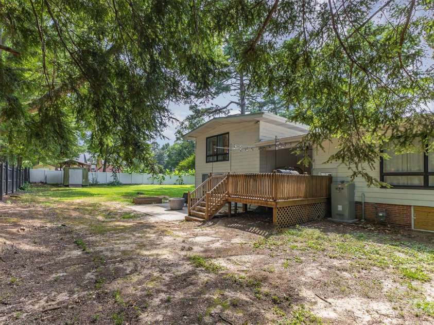 747 Saint Michaels Lane, Gastonia, NC 28052.  MLS# CAR4267169, YatesRealty ID 28066. Back Yard with Deck